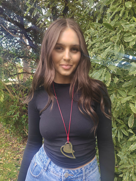 Silver Heart Shaped Pendent Necklace on Red Cord