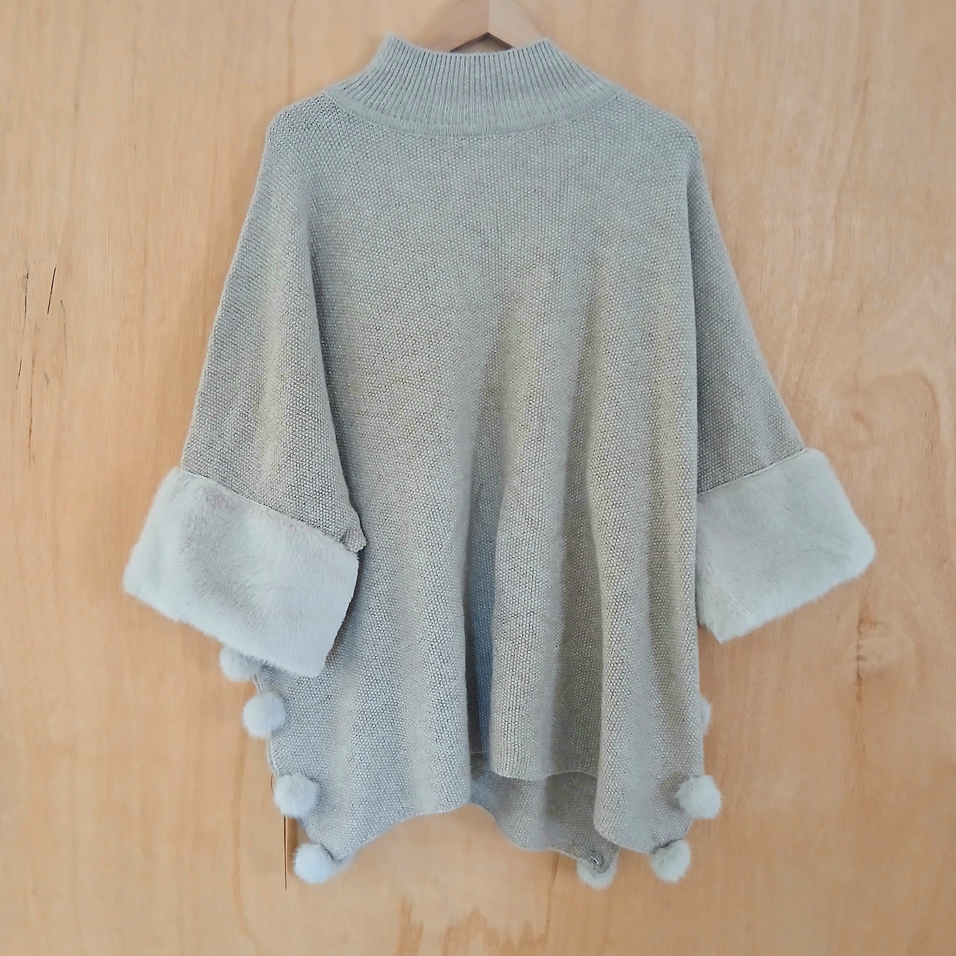 PRE-ORDER Faux Fur Poncho with Pom Poms 332767